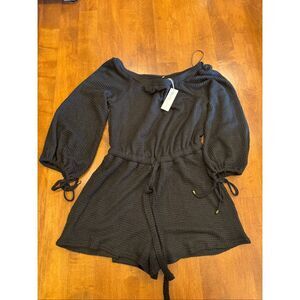 Woman’s new with tags boutique Blu Ivy long sleeve romper size medium
